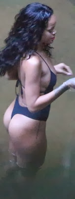 Rihanna puts her sexy body on display as she poses in skimpy